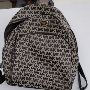 Michael Kors Monogram Backpack - Black and Brown Broken Zipper